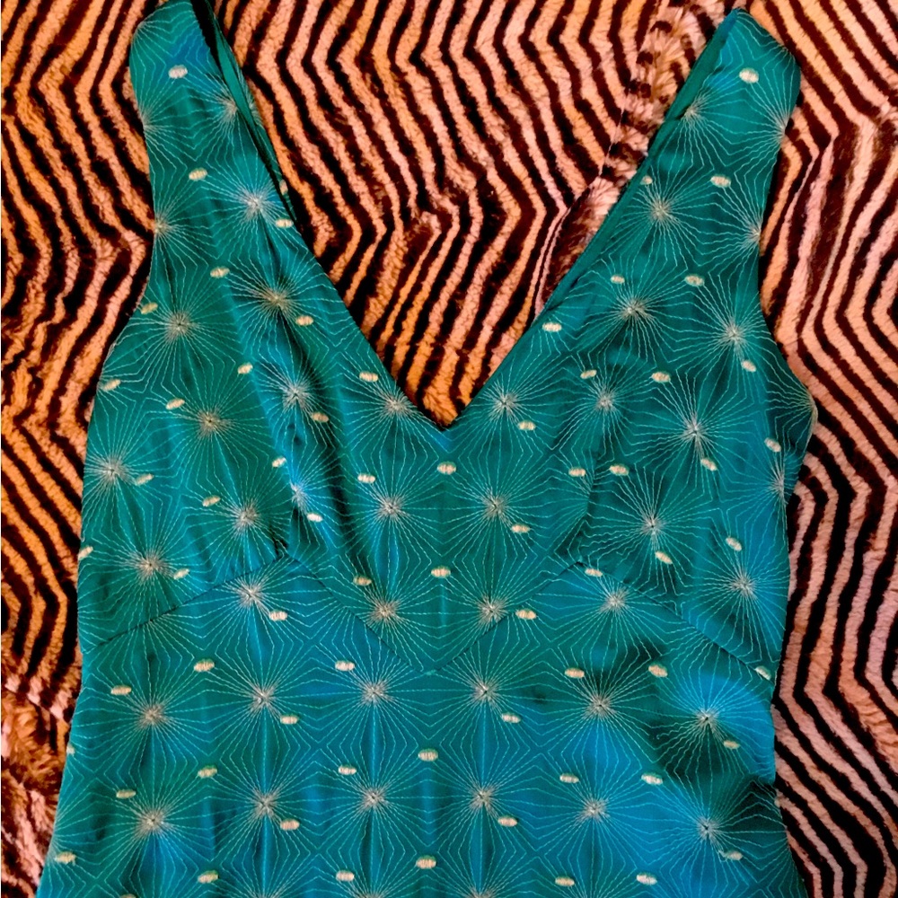 TOCCA. 100% silk & gorgeous. You will turn heads! So beautiful on.